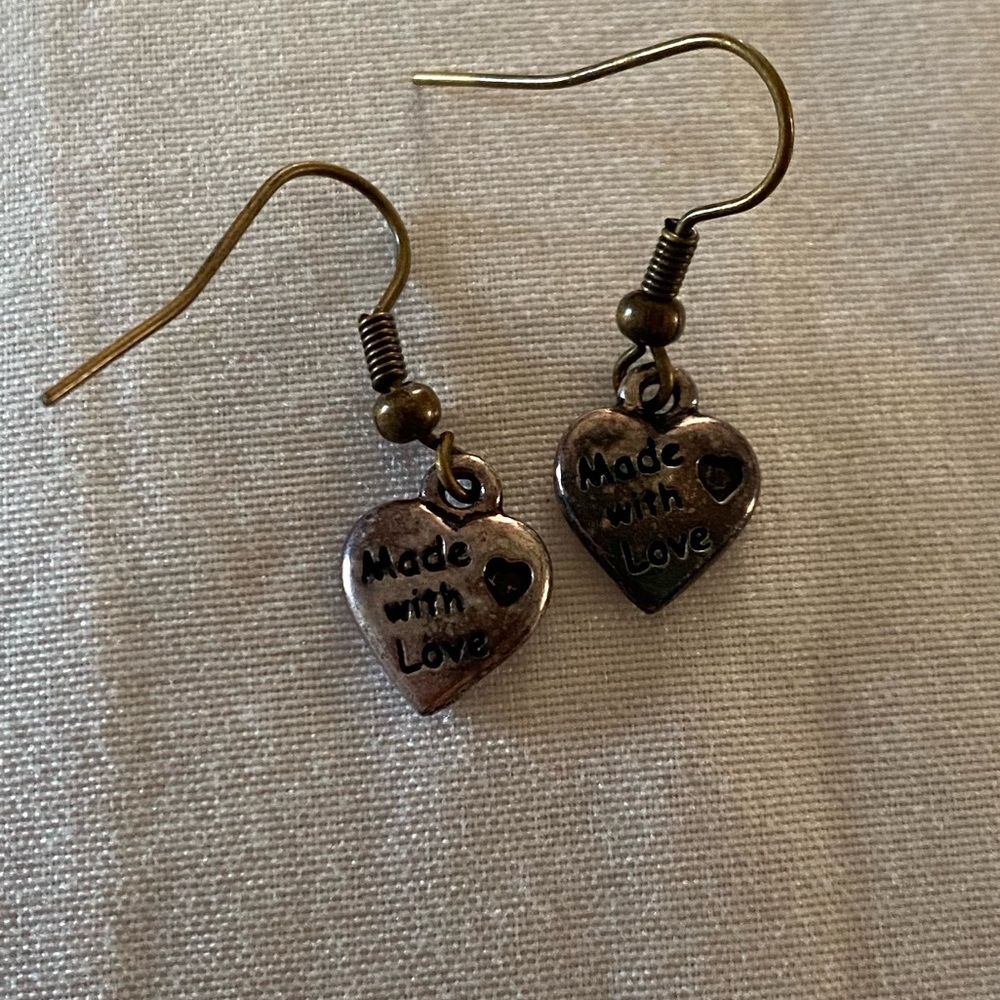 Earrings says Made With Love